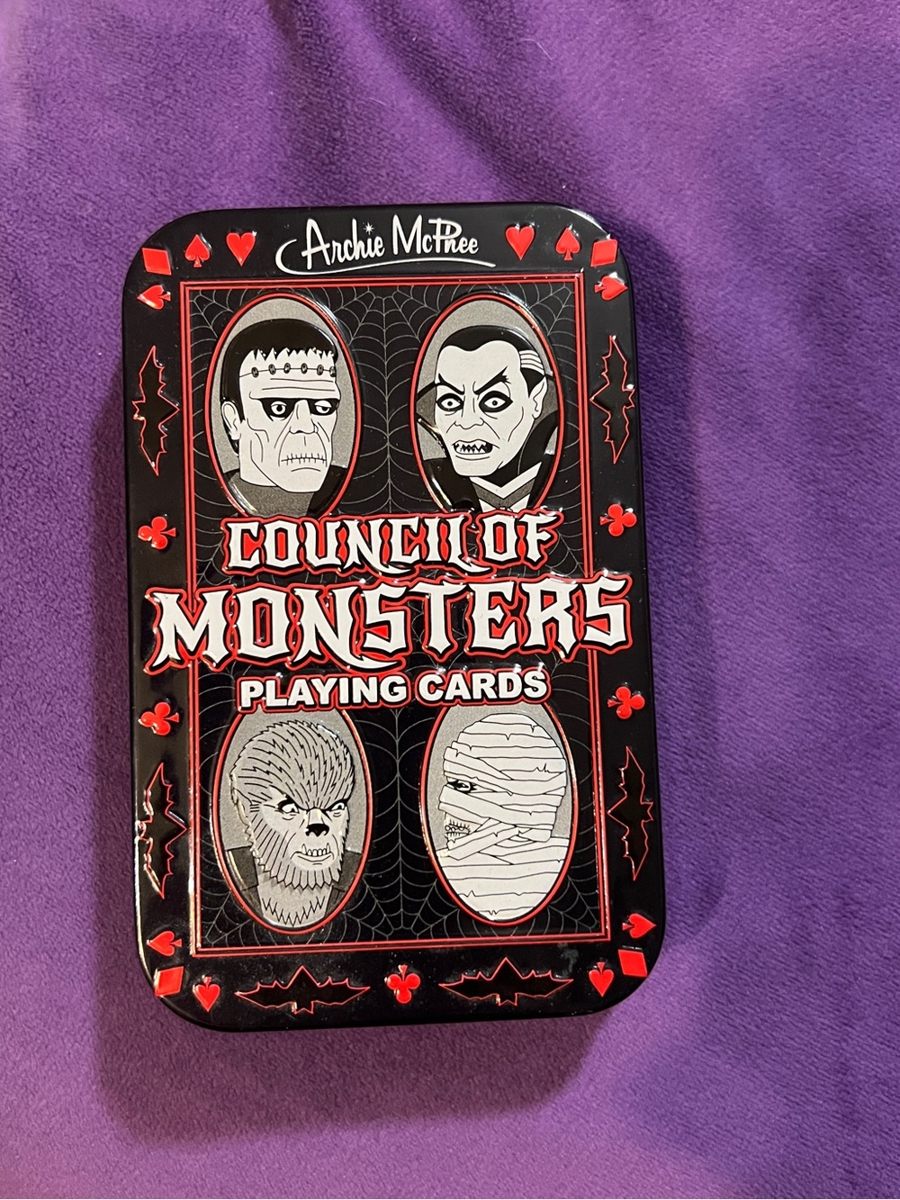Archie McPhee Council of Monsters Playing Cards - Black & Red Tin